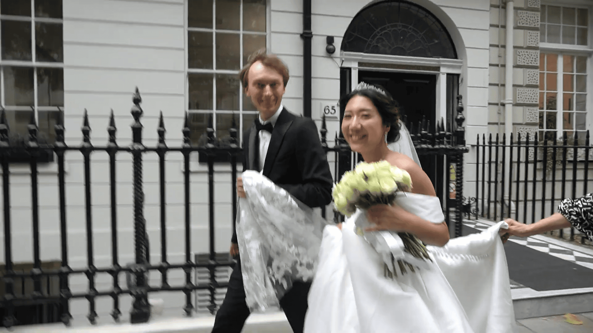 A newlywed couple during a cinematic filming experience in London